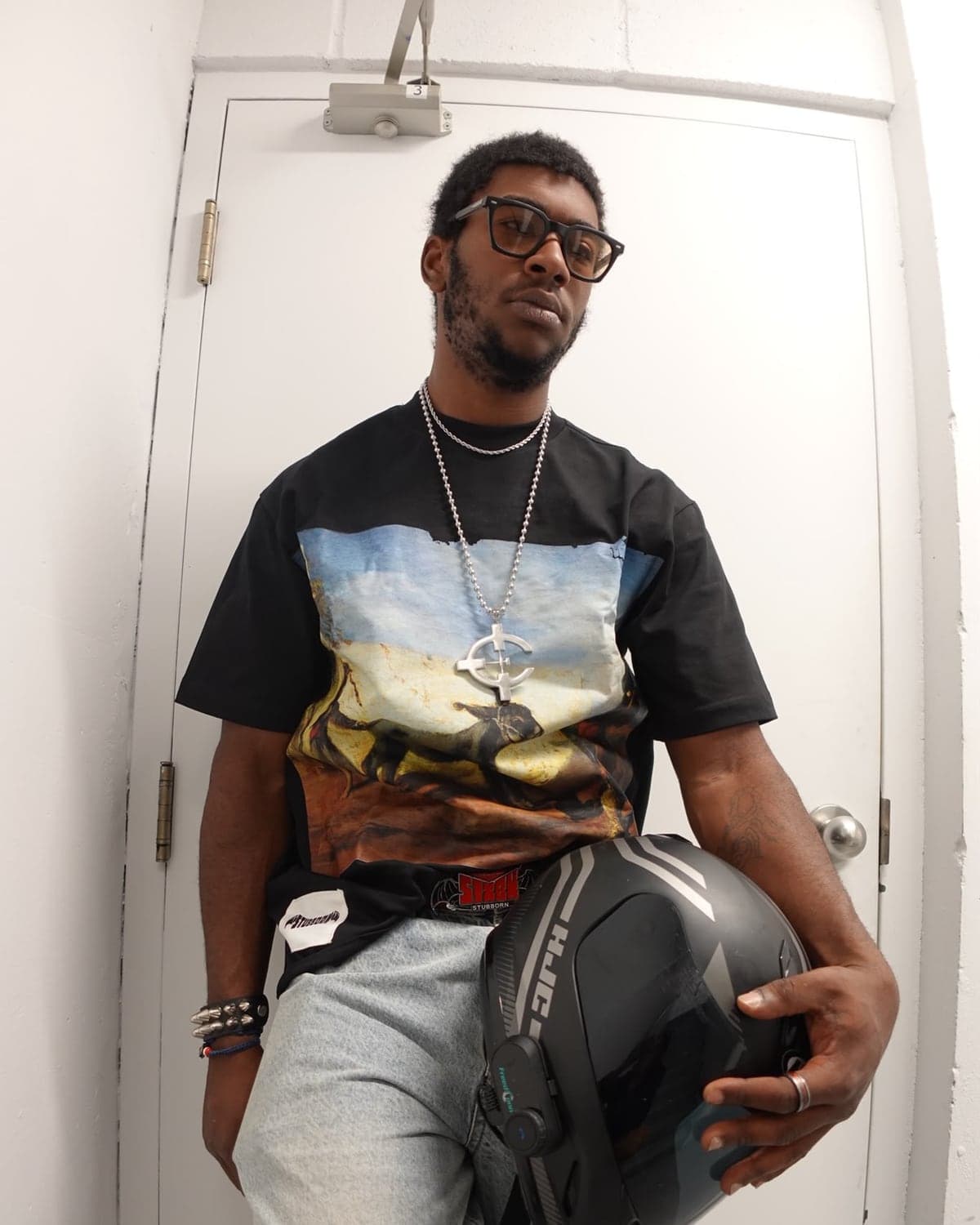 The Stubborn Masterpiece Tee worn with light denim